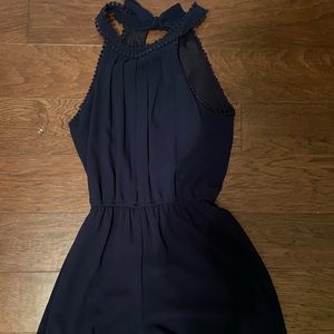 Navy romper with cute detailing
